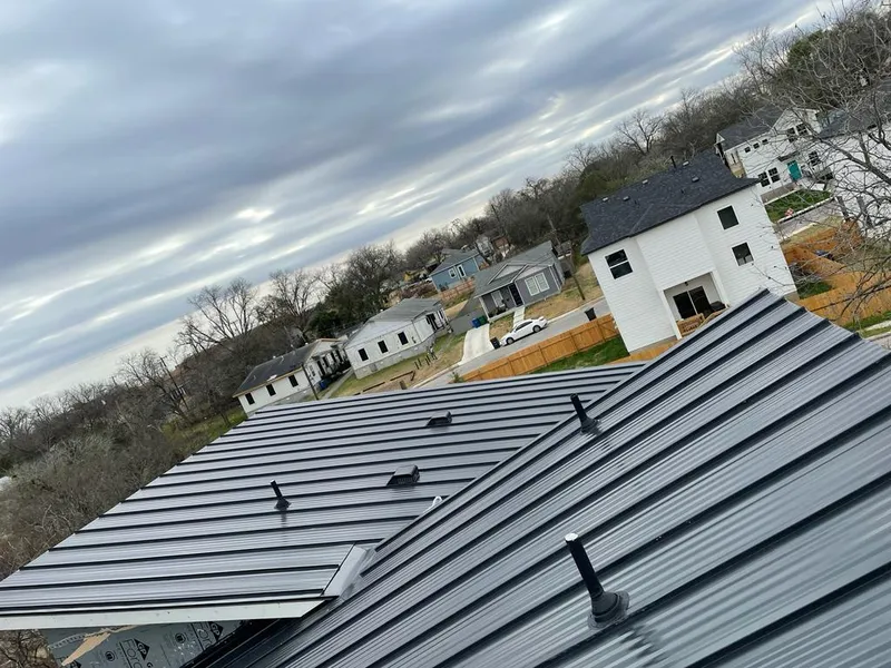 Standing seam metal roof panels with vents for Skylight Repair in Bernardsville